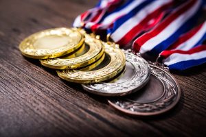 Read more about the article The Weight of Glory: Why Athletes Chase Medals